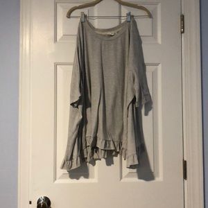 Grey Ruffle bottom, wide blouse.